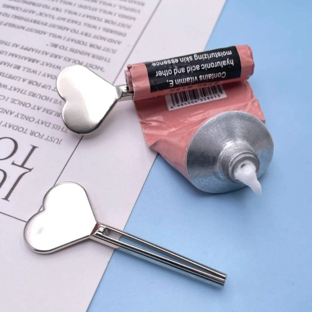 迷你愛心擠牙膏器-護手霜適用 (旋轉擠護手霜器 洗面乳 牙膏夾 軟管 護手霜 擠壓器)